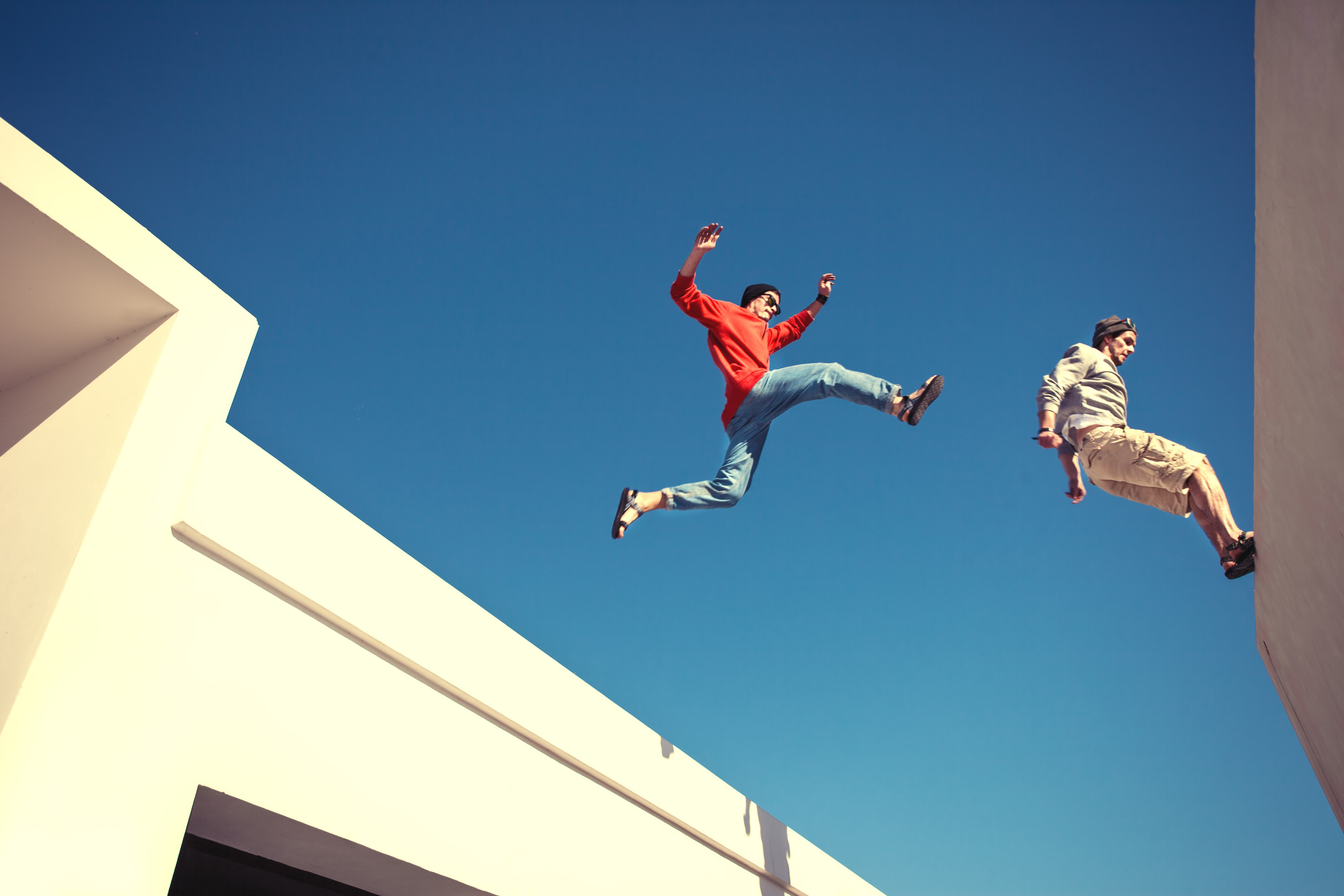 Two guys doing parkour
